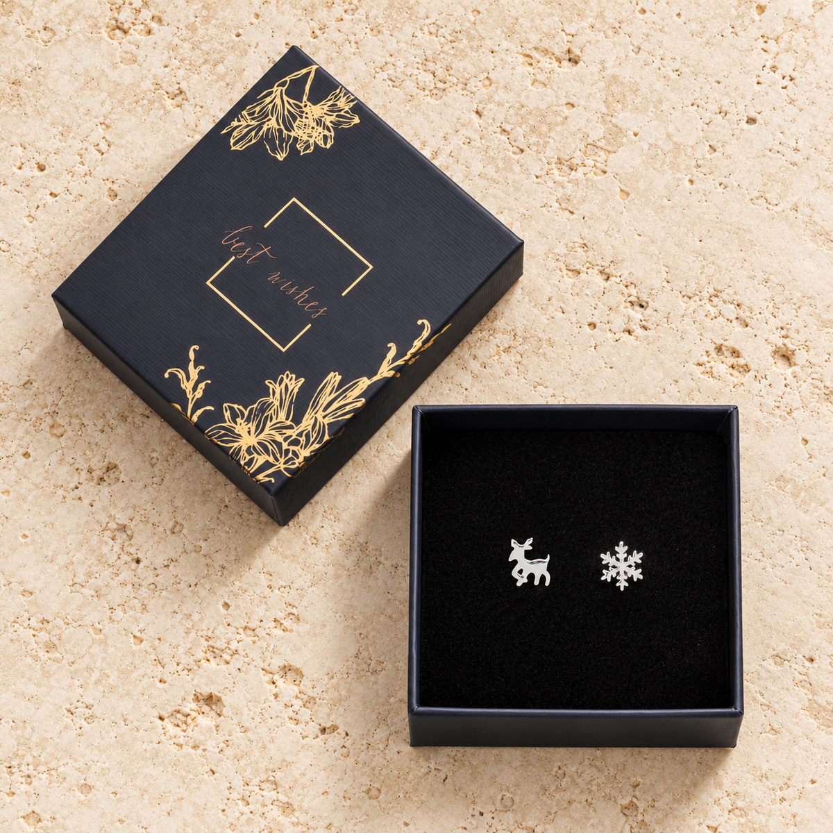 callura deer & snowflake stud earrings